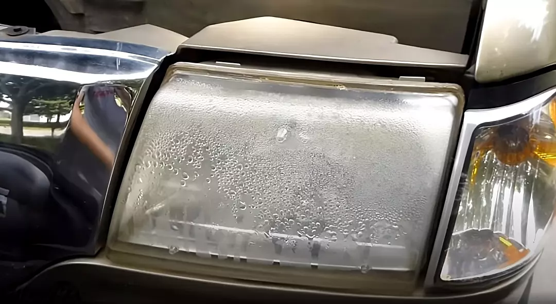 how to remove moisture from headlight