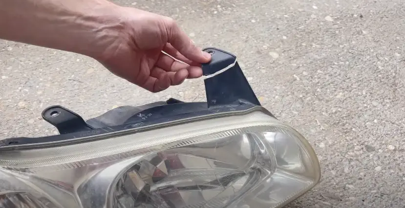 how to repair a cracked car headlight